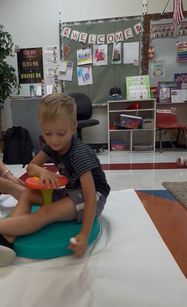 Preschoolers celebrating dot day in their classroom