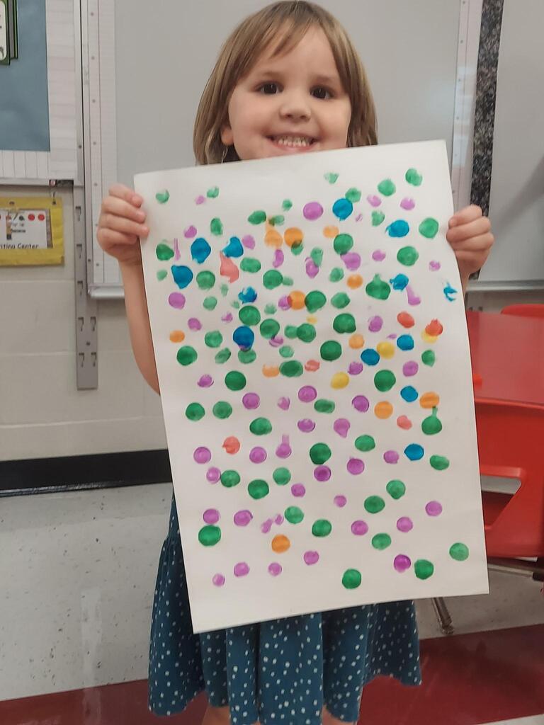 Preschoolers celebrating dot day in their classroom