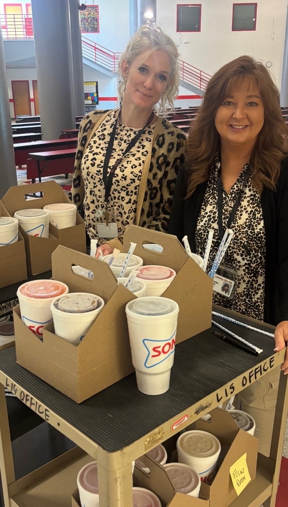 Principal and Assistant Principal Delivering Sonic Drinks on a cart to staff