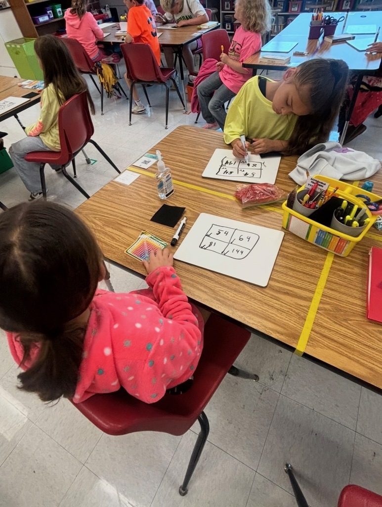 Students learning Math at desks