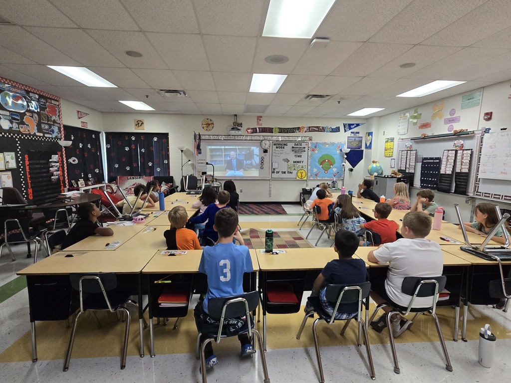 Third grade students in a mock trial in their classroom