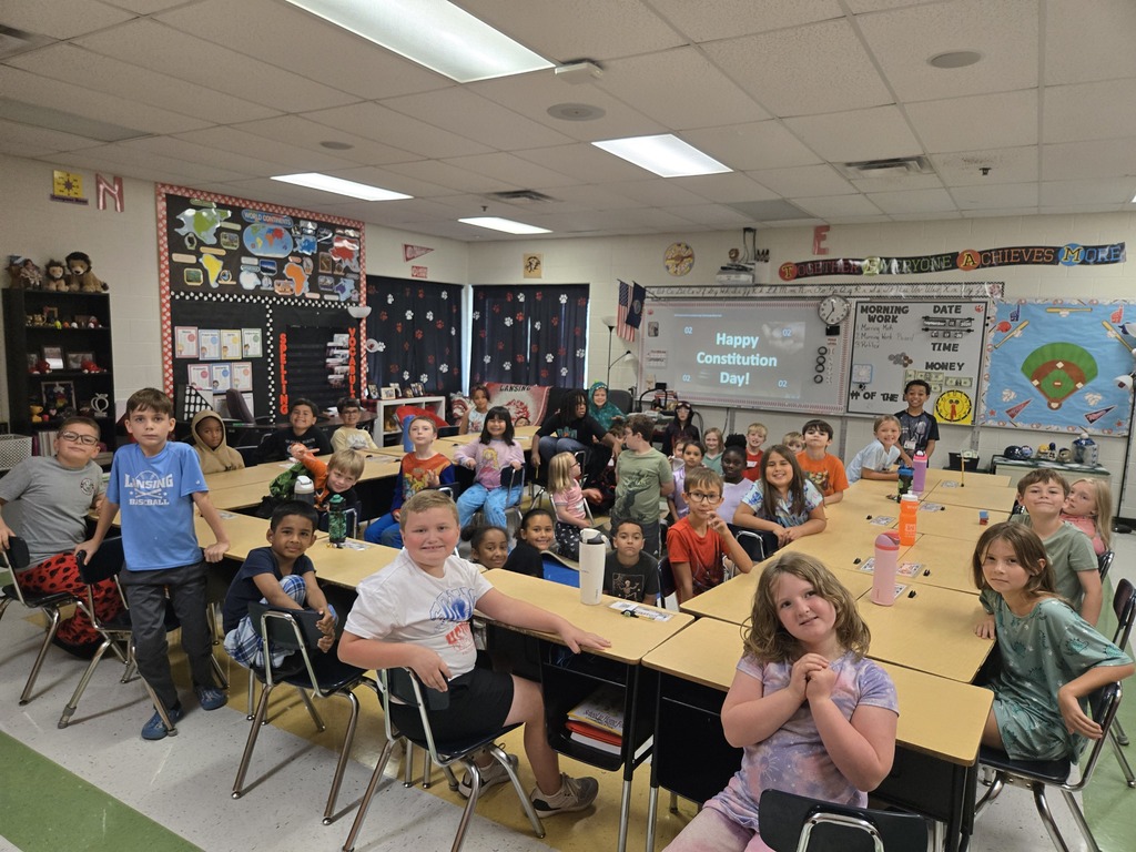Third grade students in a mock trial in their classroom