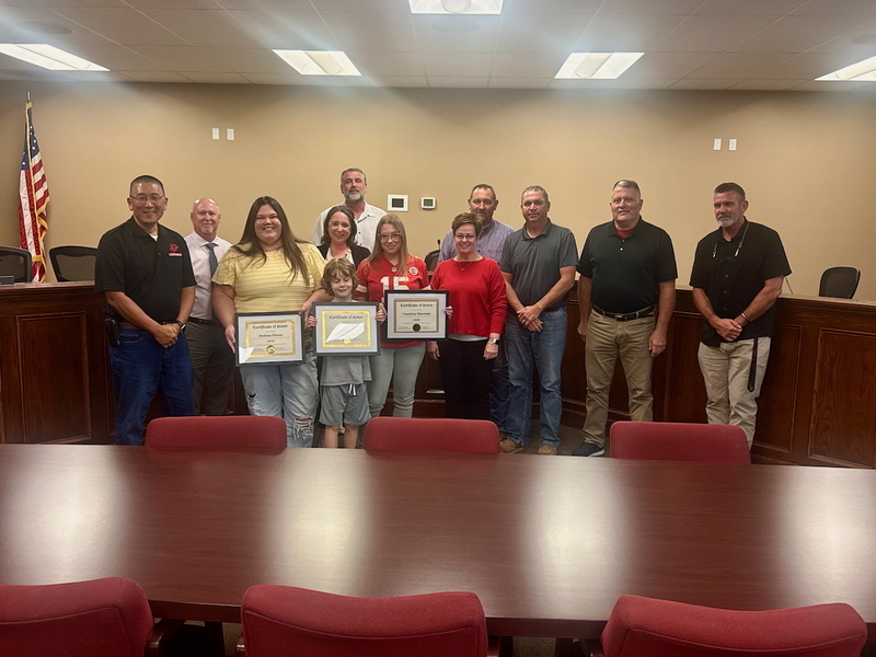 Board of Education with staff members and student of the month
