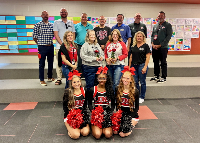 Teacher receiving grant from educational foundation