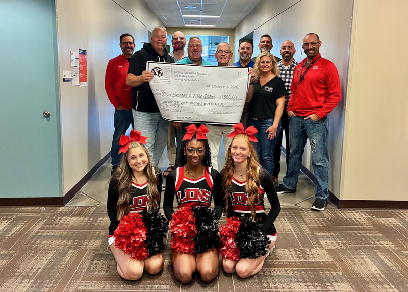 Teacher receiving grant from educational foundation
