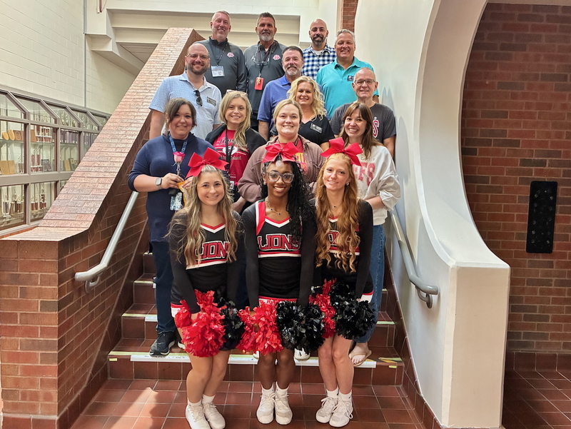 Teacher receiving grant from educational foundation
