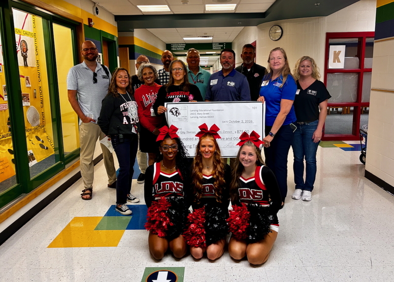 Teacher receiving grant from educational foundation