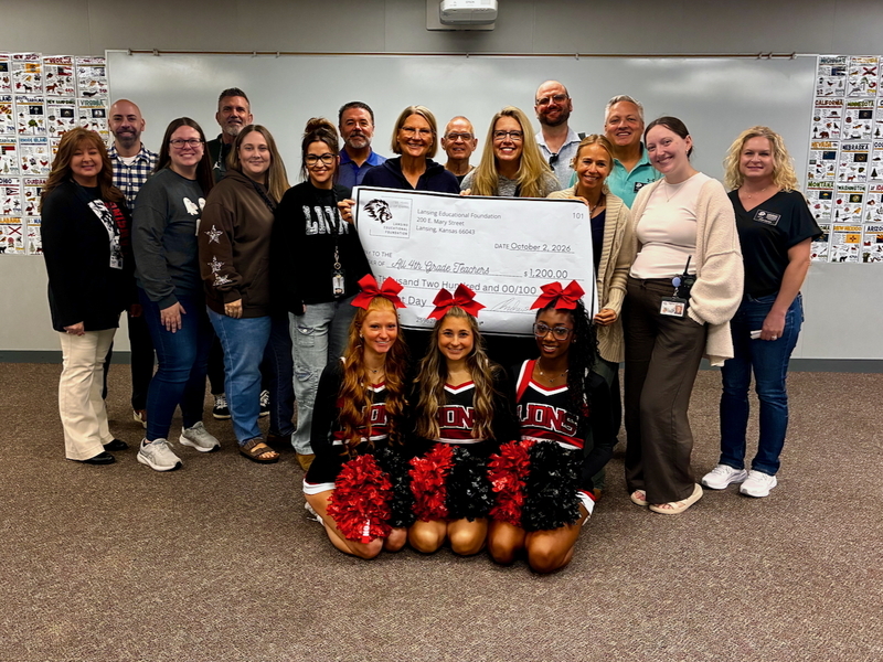 Teacher receiving grant from educational foundation
