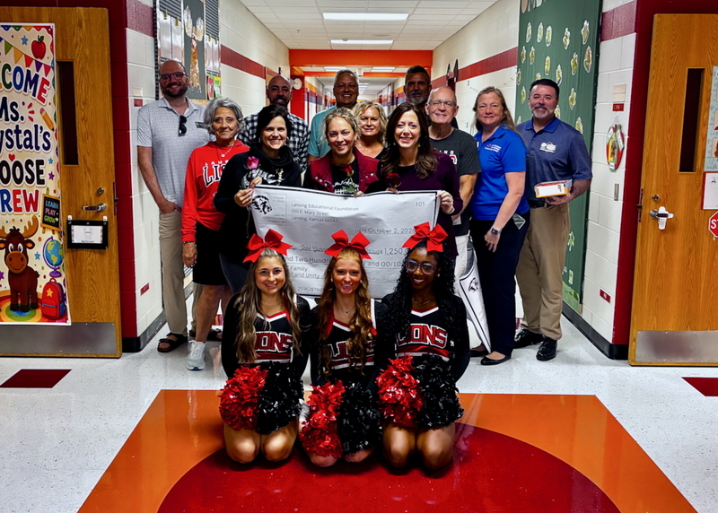Teacher receiving grant from educational foundation