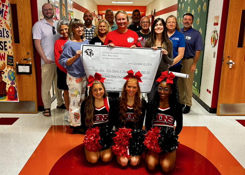 Teacher receiving grant from educational foundation