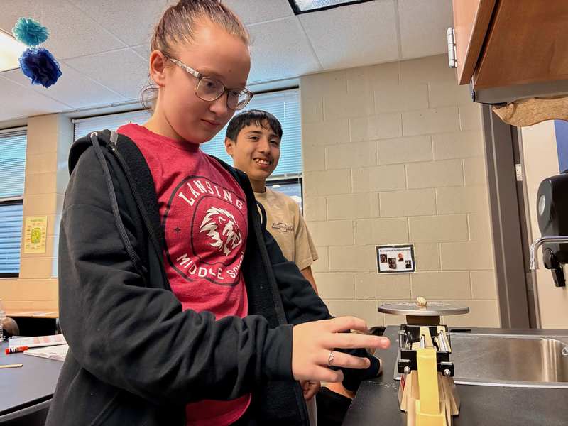8th grade students doing labs