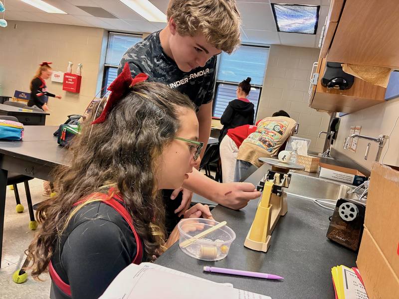 8th grade students doing labs