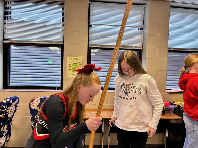 8th grade students doing labs