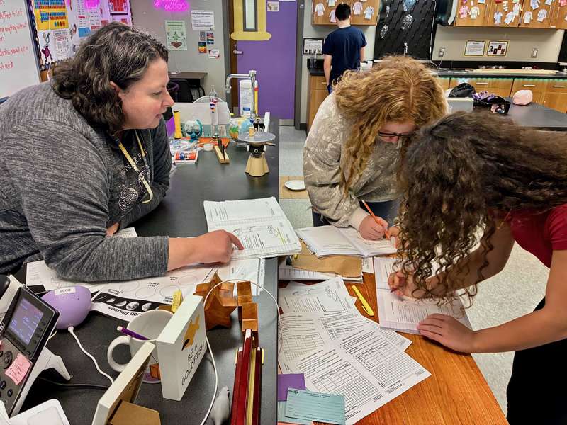 8th grade students doing labs