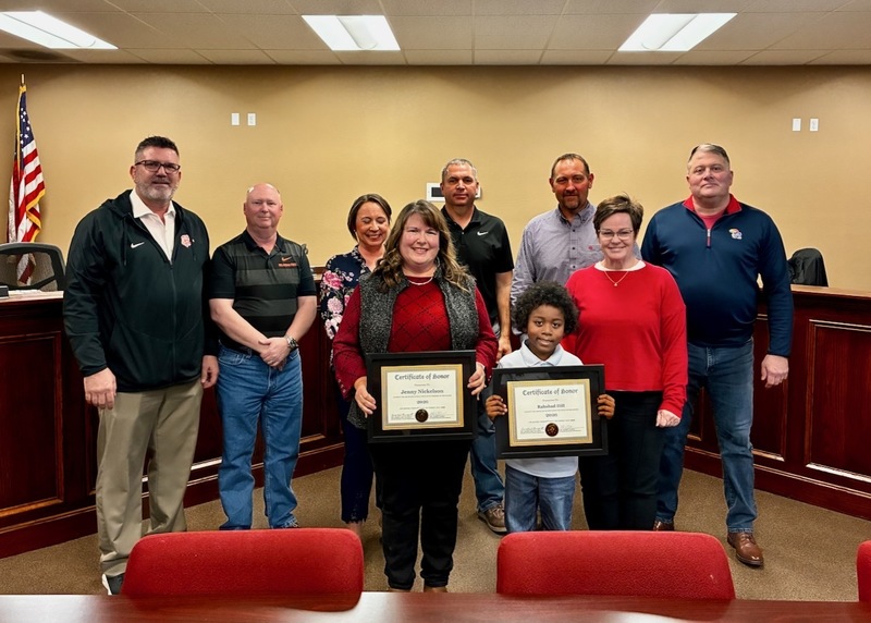 Student and staff member of the month with board of education