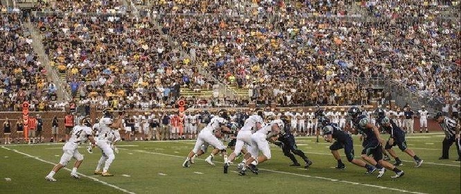 Photo of Lapeer and Clarkston football teams at Michigan Stadium