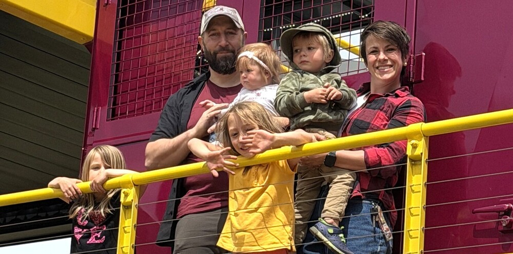 Christopher Weber and his wife and four children