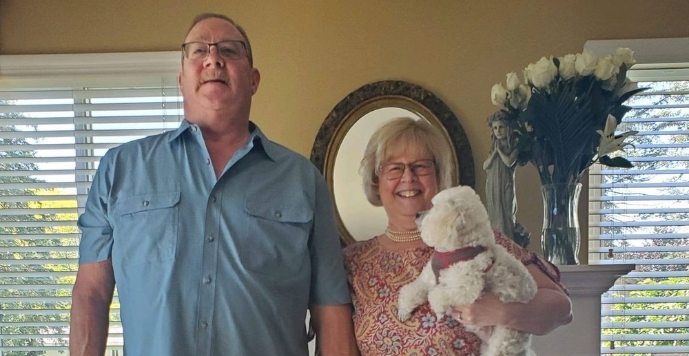 Roxann Johnson with her husband and dog