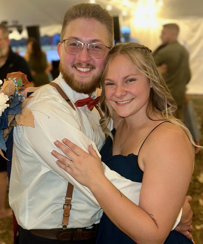 Abby Rhinehart posing and smile with her fiance