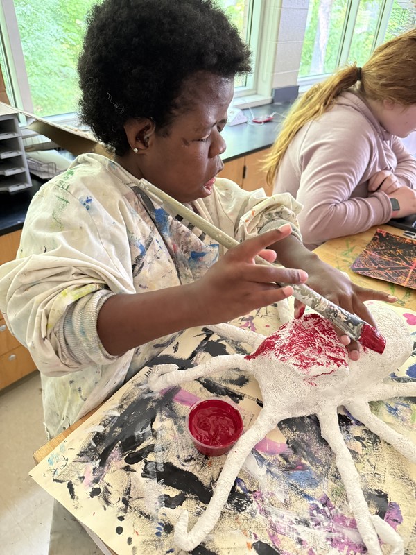 Journee Lally working on an octopus art project