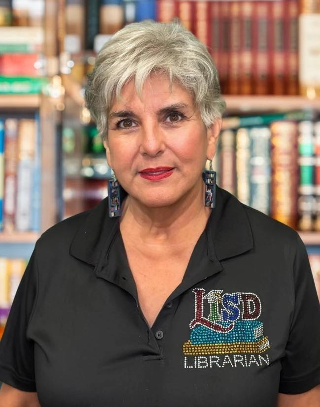 Mrs. Reyes Librarian