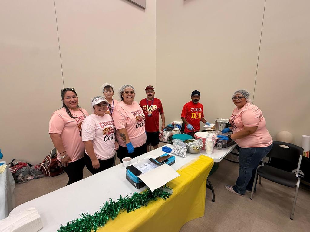 parents volunteering to help out at the concession stand