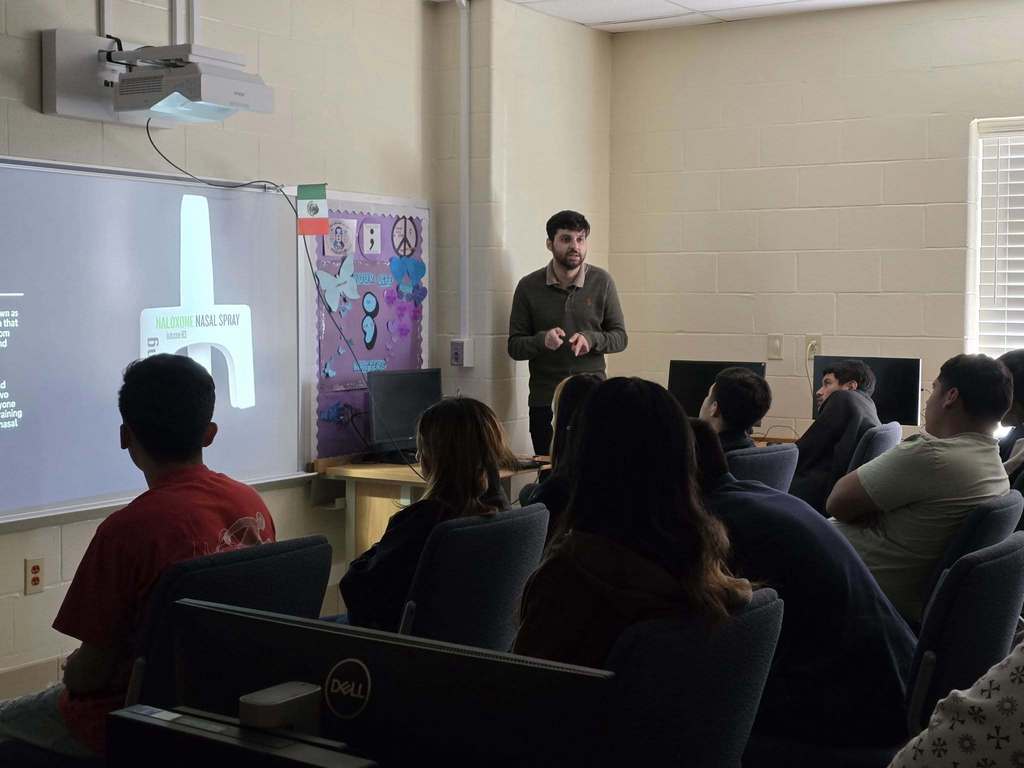 Scan counselor lecturing kids