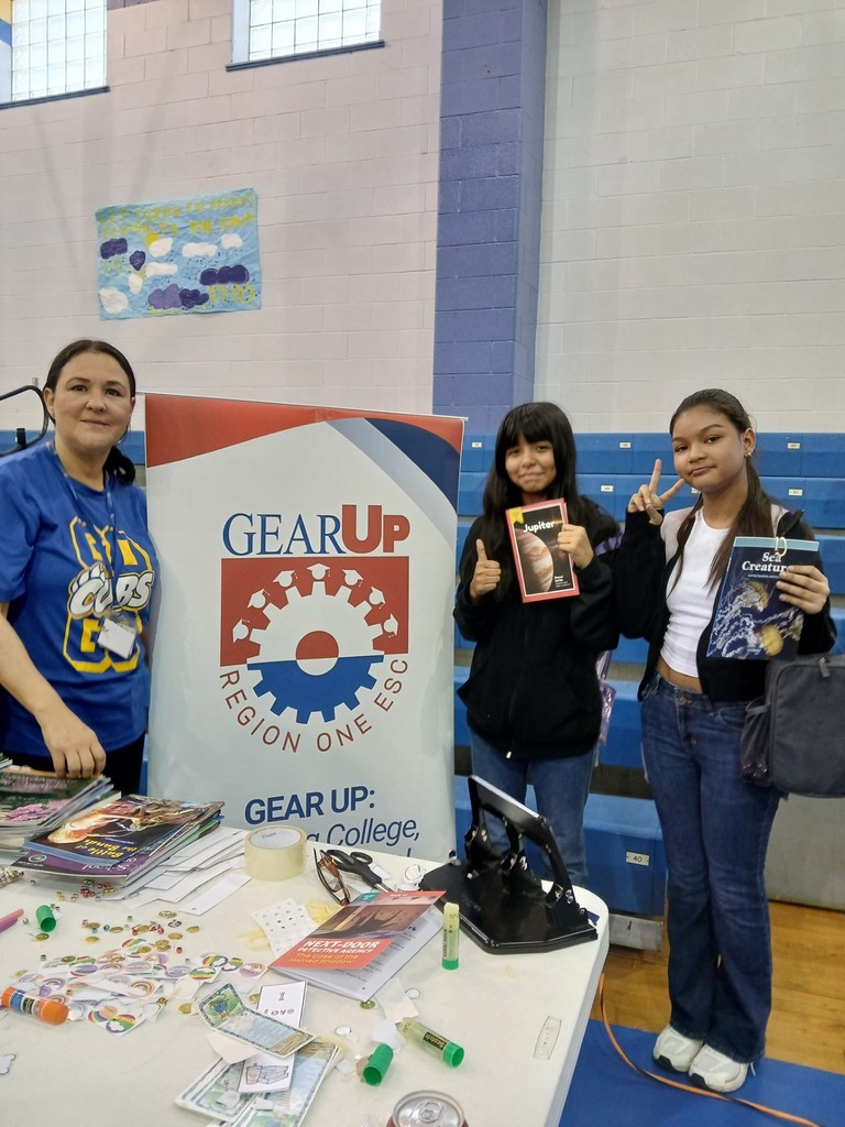 Christen Middle Reading Night GEAR UP students receive books and created their bookmarks