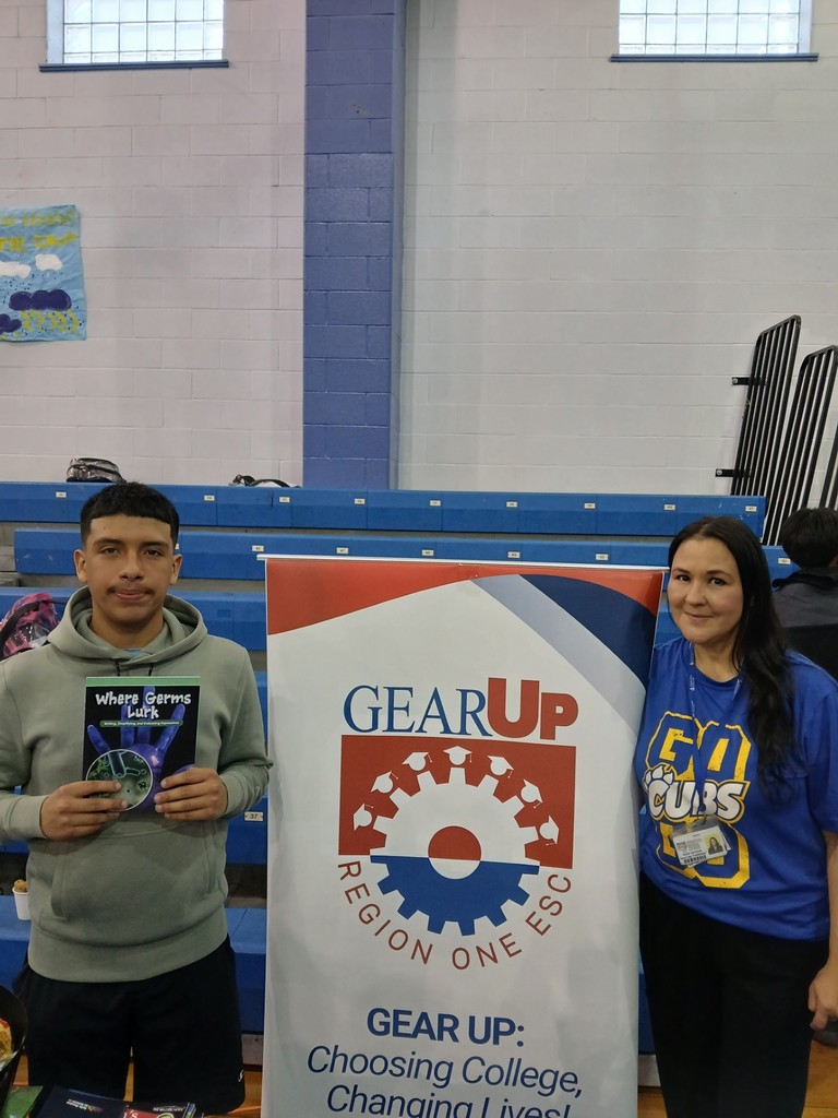 Christen Middle Reading Night GEAR UP students receive books and created their bookmarks