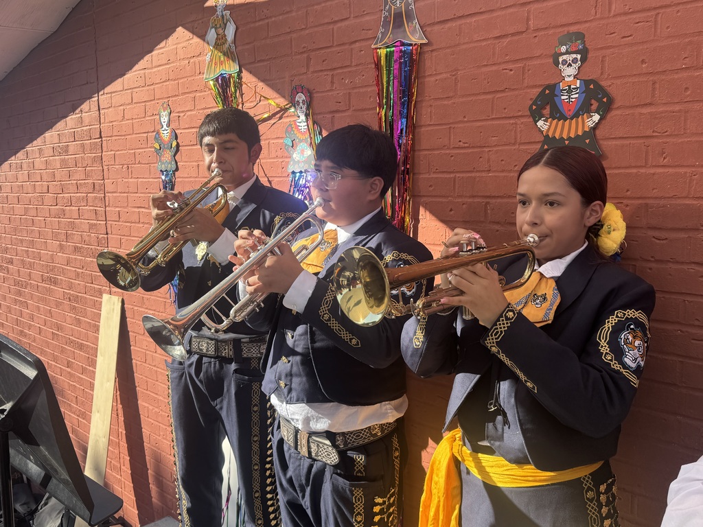 Mariachi Los Tigrillos de Oro represented Christen middle school at the Dia de Los Muerto Jamaica for Mother Cabrini Church this past Sunday. Parents and Students enjoyed music, Jamaica's activities, and supported our community in the Jamaica.