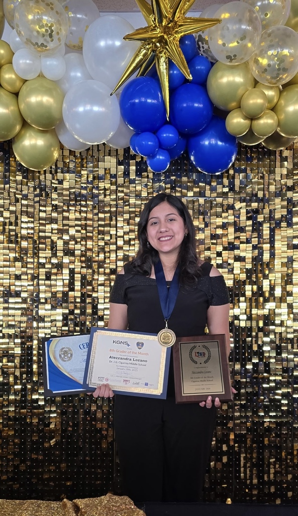 Alezzandra holding trophies