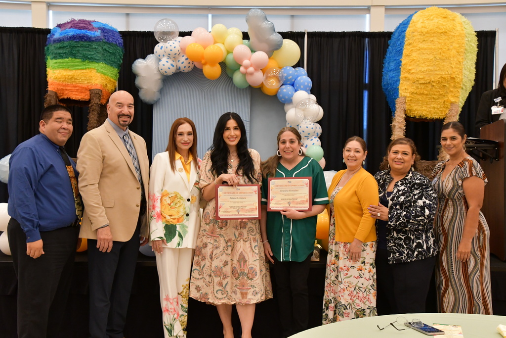 National Library Week Proclamation  librarian posing with certificate