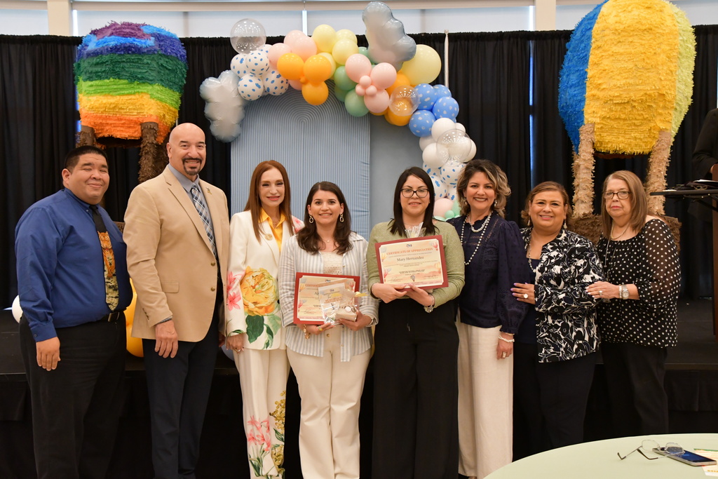National Library Week Proclamation  librarian posing with certificate