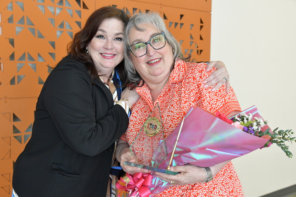 Librarian of the Year Ana Teresa Garcia posing with  school principal Marcia 