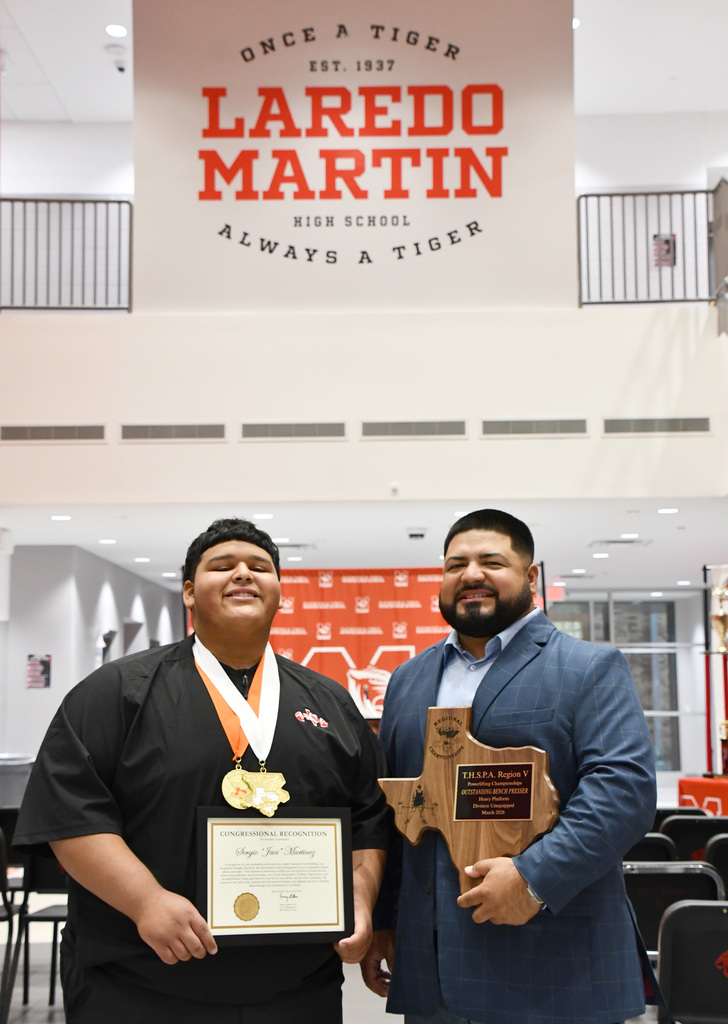 picture of coach duron and javi with his recognitions