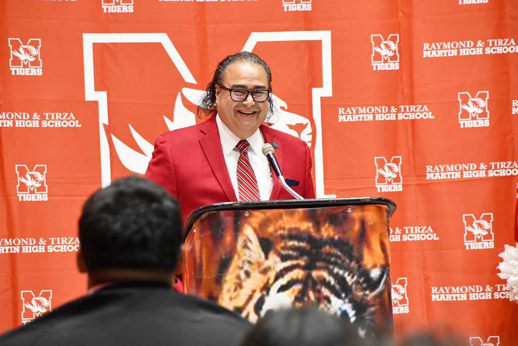 LISD Board President Goyo M. Lopez talking at the podium