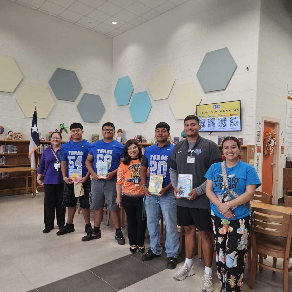 CHS Football team came in to GREET and read to our Kinder students.