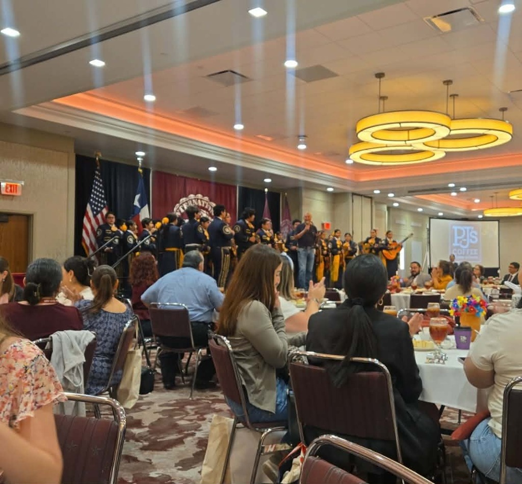 Mariachi Los Tigrillos de Oro brought music to the TAMIU Bilingual Conference-Session Program providing music for the conference attendees. v
