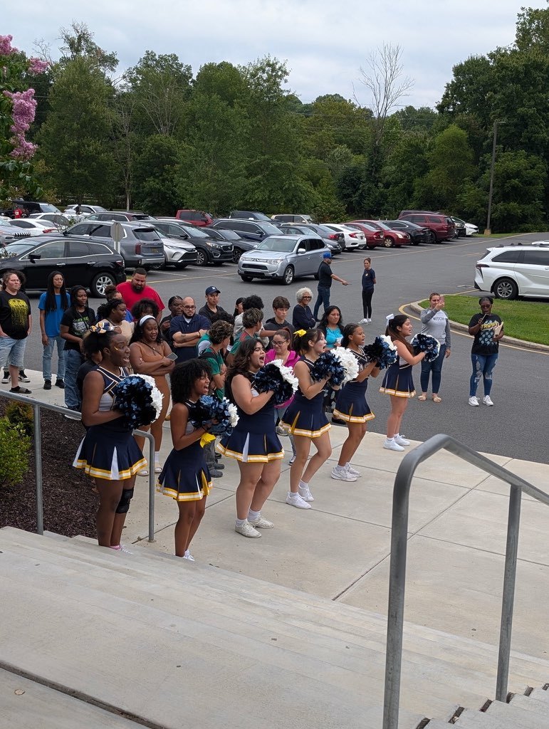 ACHS Cheer Team greet students & families