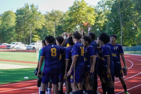 Soccer Team Huddle