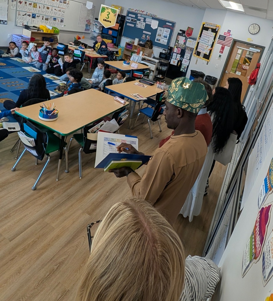 international students observing a 2nd grade classroom