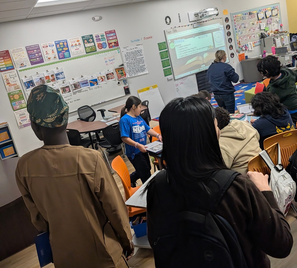 international students observing  a 5th grade classroom
