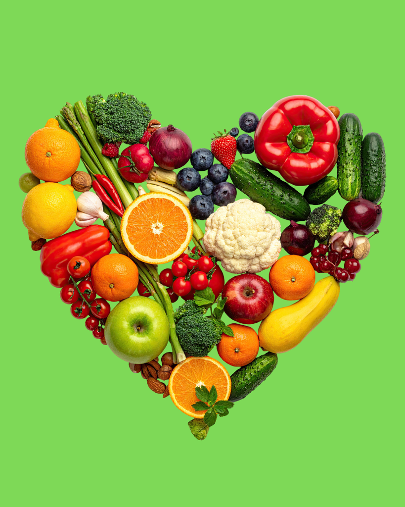 image for nutrition month. green background with colorful fruits and vegetables in a heart shape.