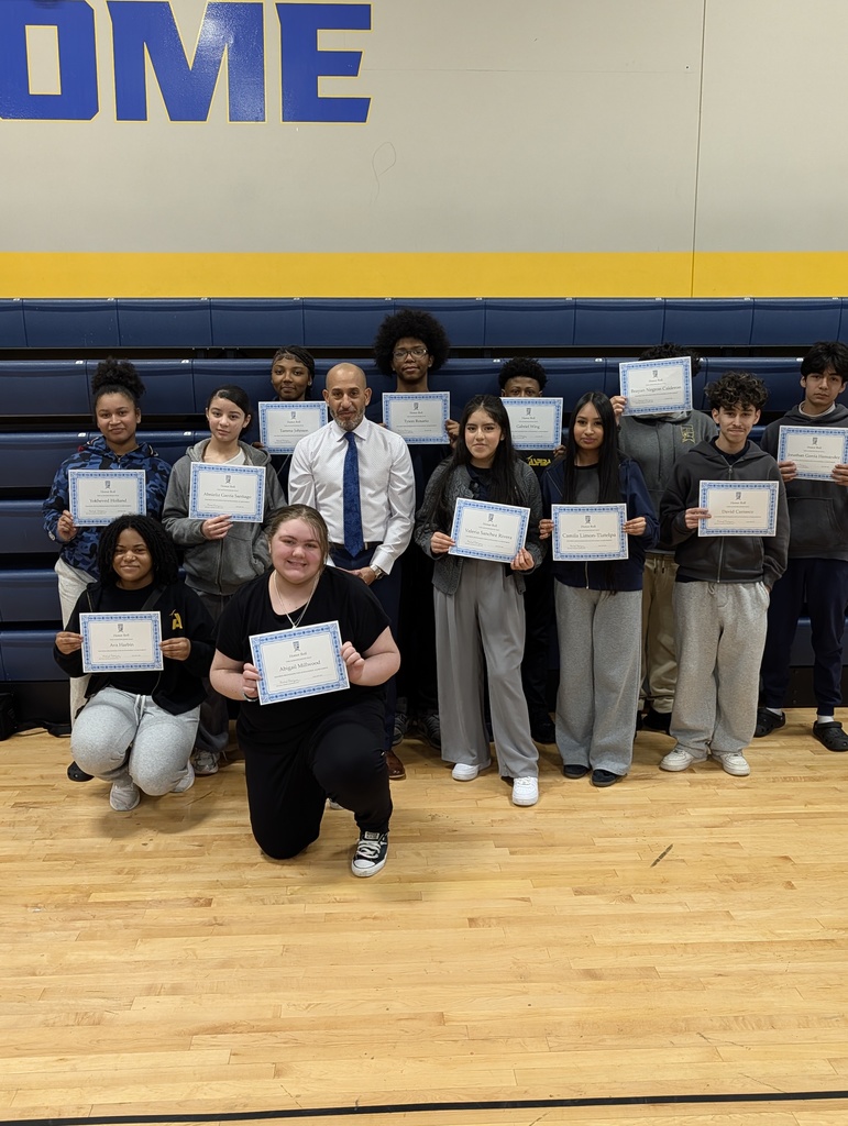 HS Honor roll students holding their certificates