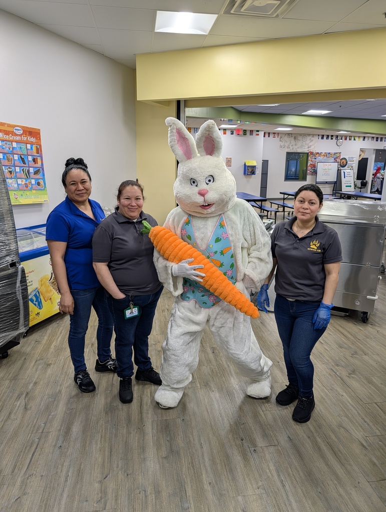 Easter Bunny with team members from nutrition