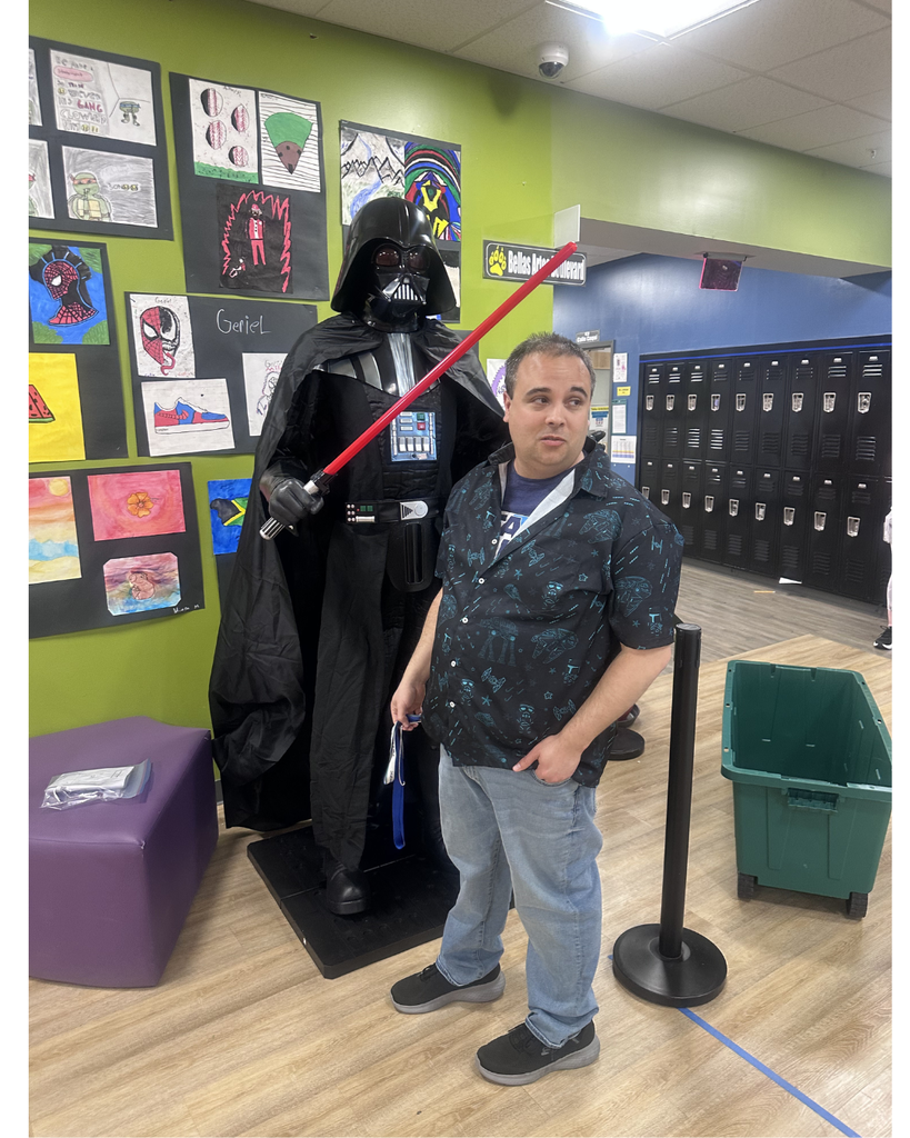 Mr. Hill posing with Darth Vader statue