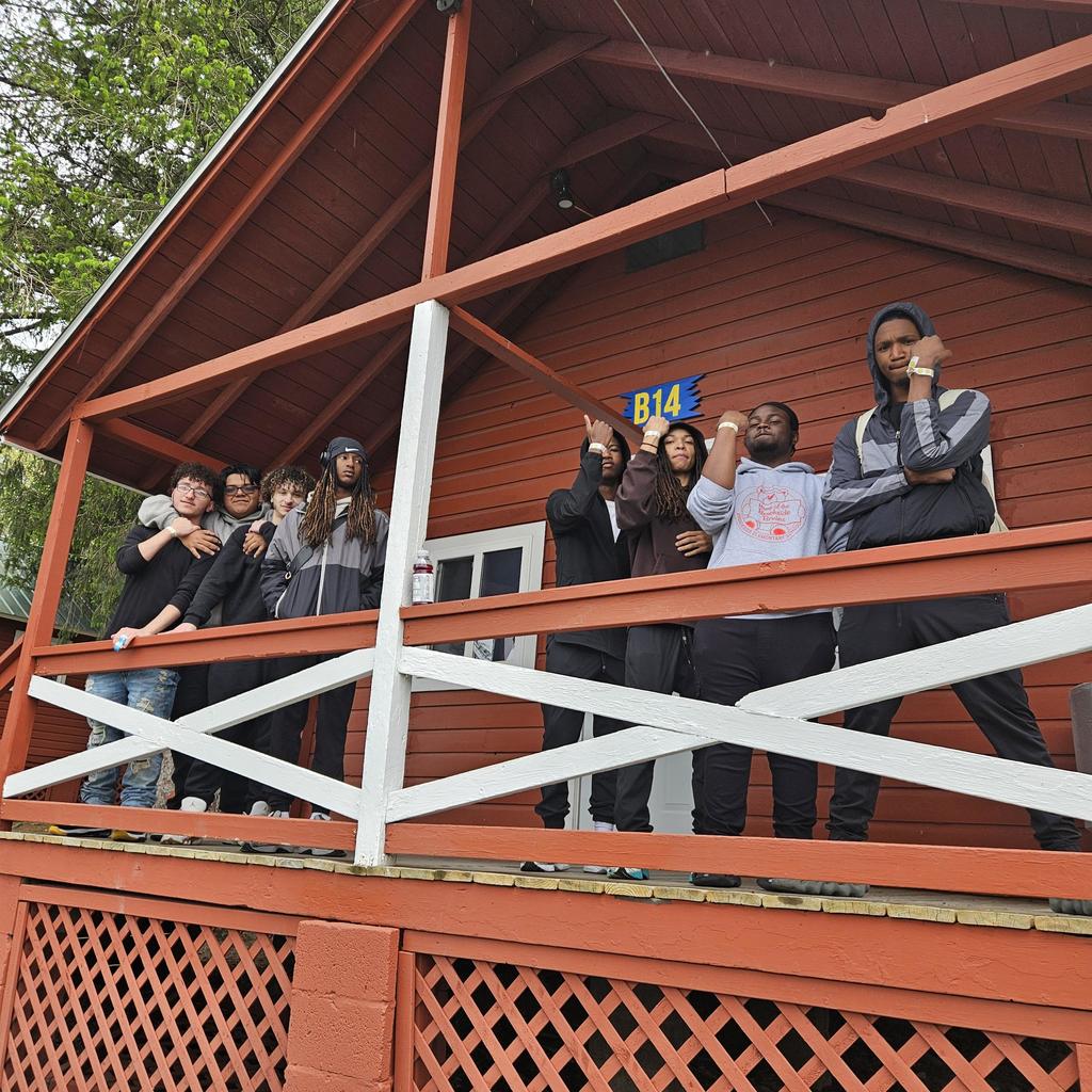 Senior trip to poconos students posing on balcony