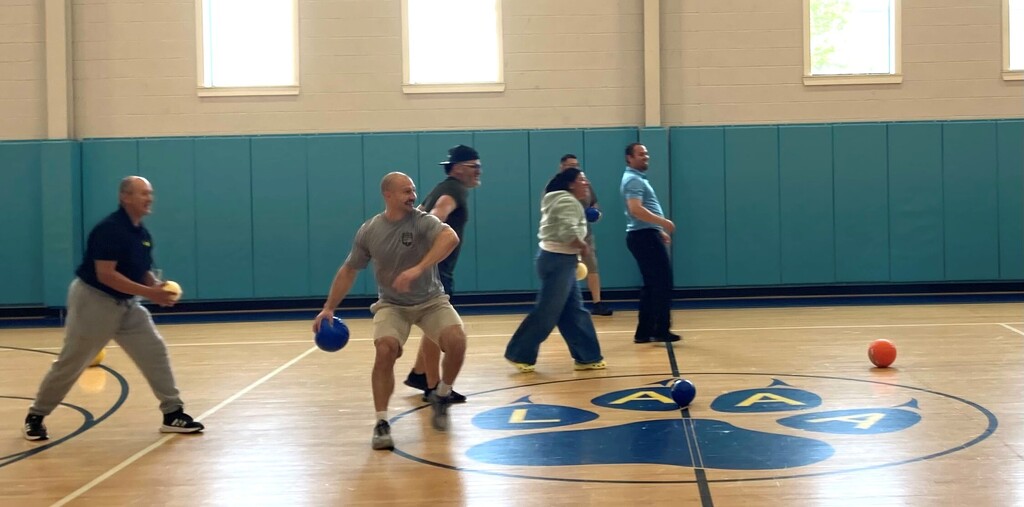 teachers playing dodge ball on Mr P's team