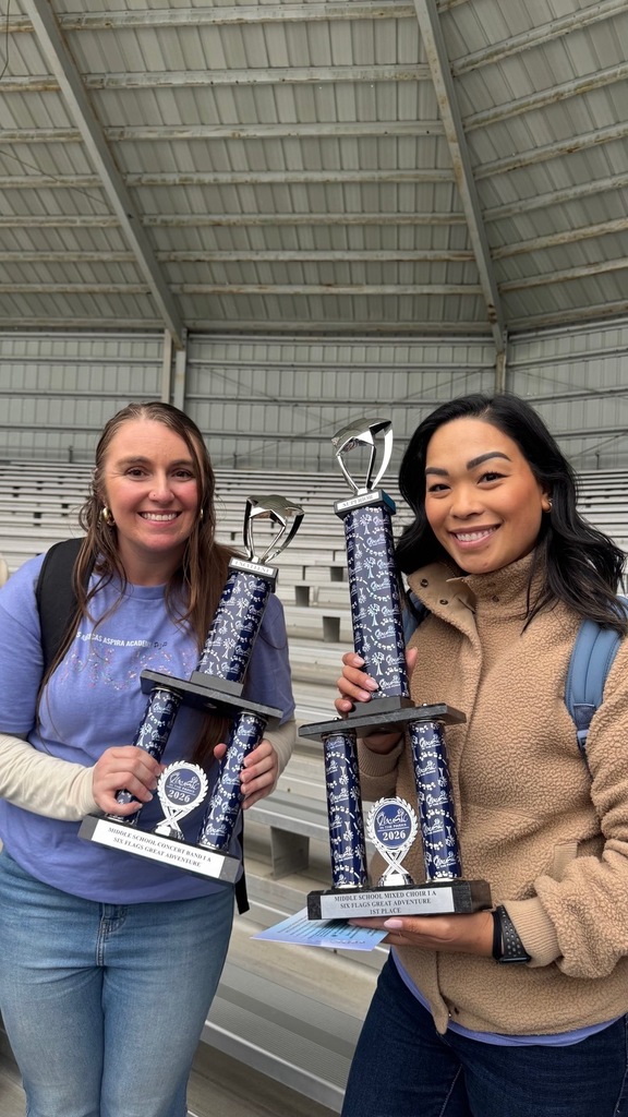 Miss Heacock and Ms Espiritu with trophies from music in the park