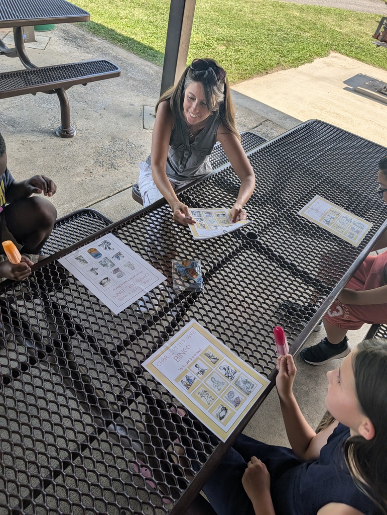 teacher and students eating popsicles and playing bingo